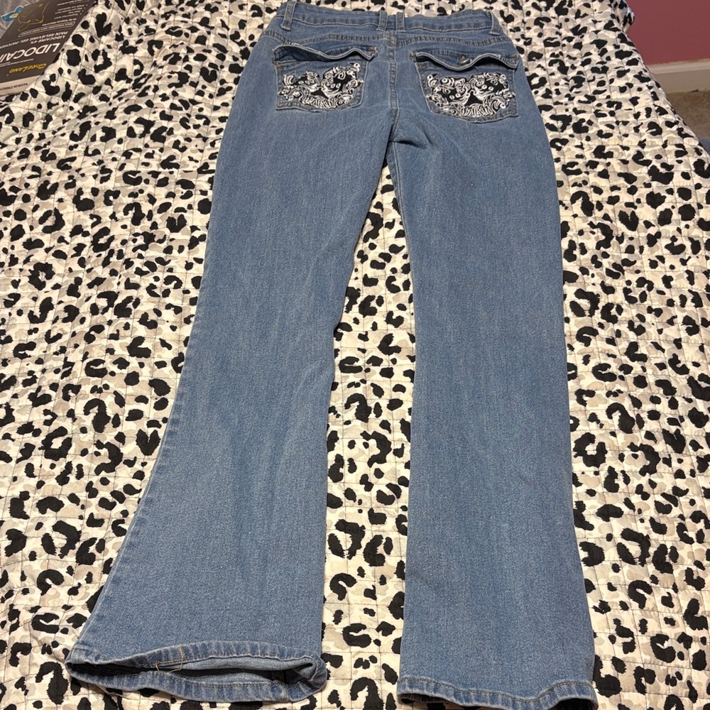 SHEIN Blue Flare Jeans with Black Embroidered Pockets